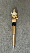 Tan cow pen