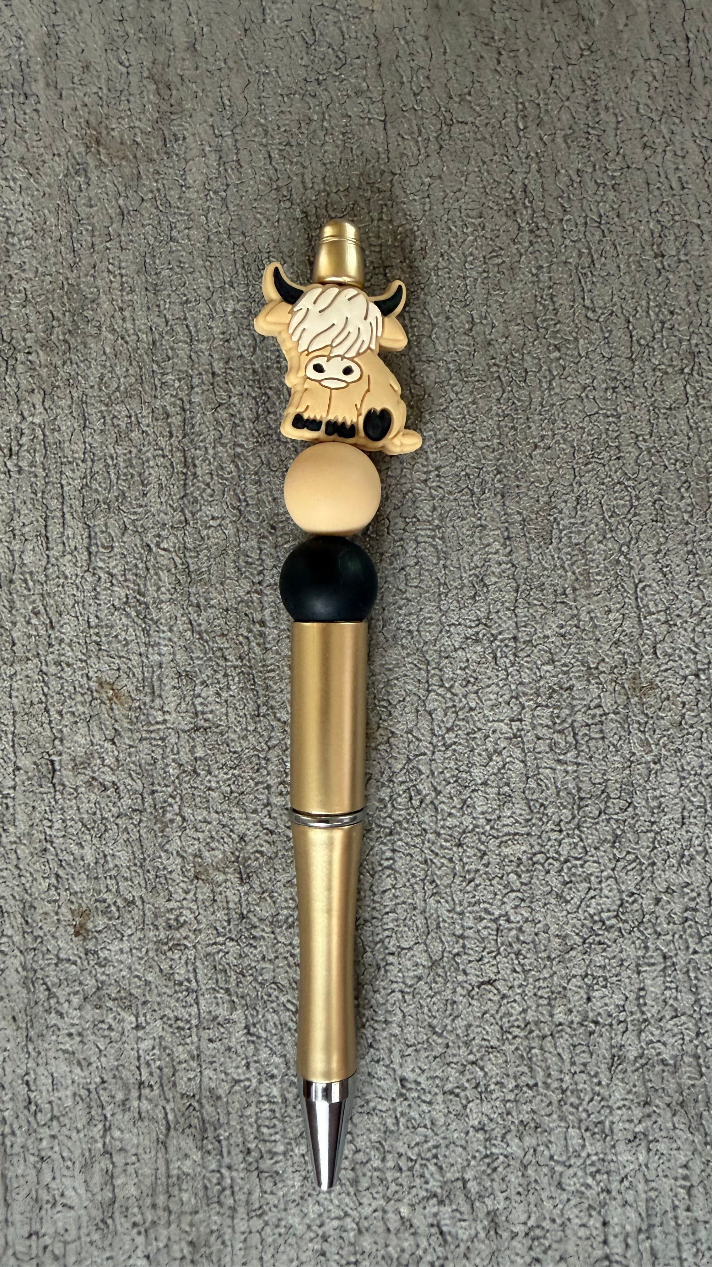 Tan cow pen