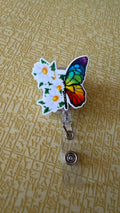 Rainbow flower butterfly badge reel