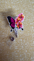 Pink butterfly flower badge reel
