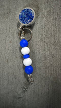 Blue jeweled beaded badge reel