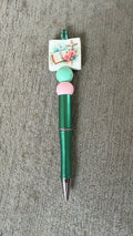Bible and cross pen
