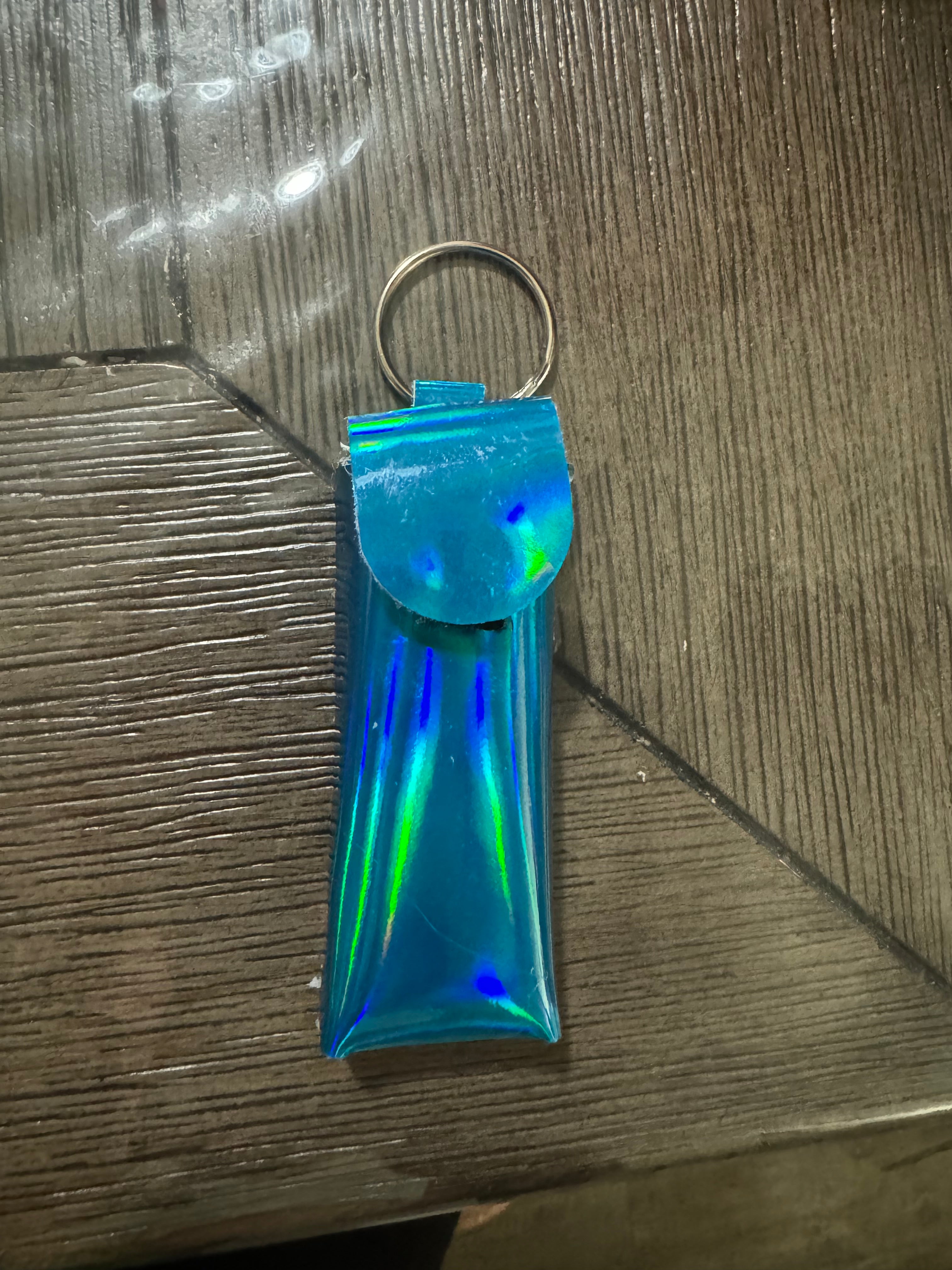 Holographic blue chapstick holder