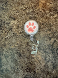 Paw print badge reel