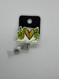 Peace love green badge reel