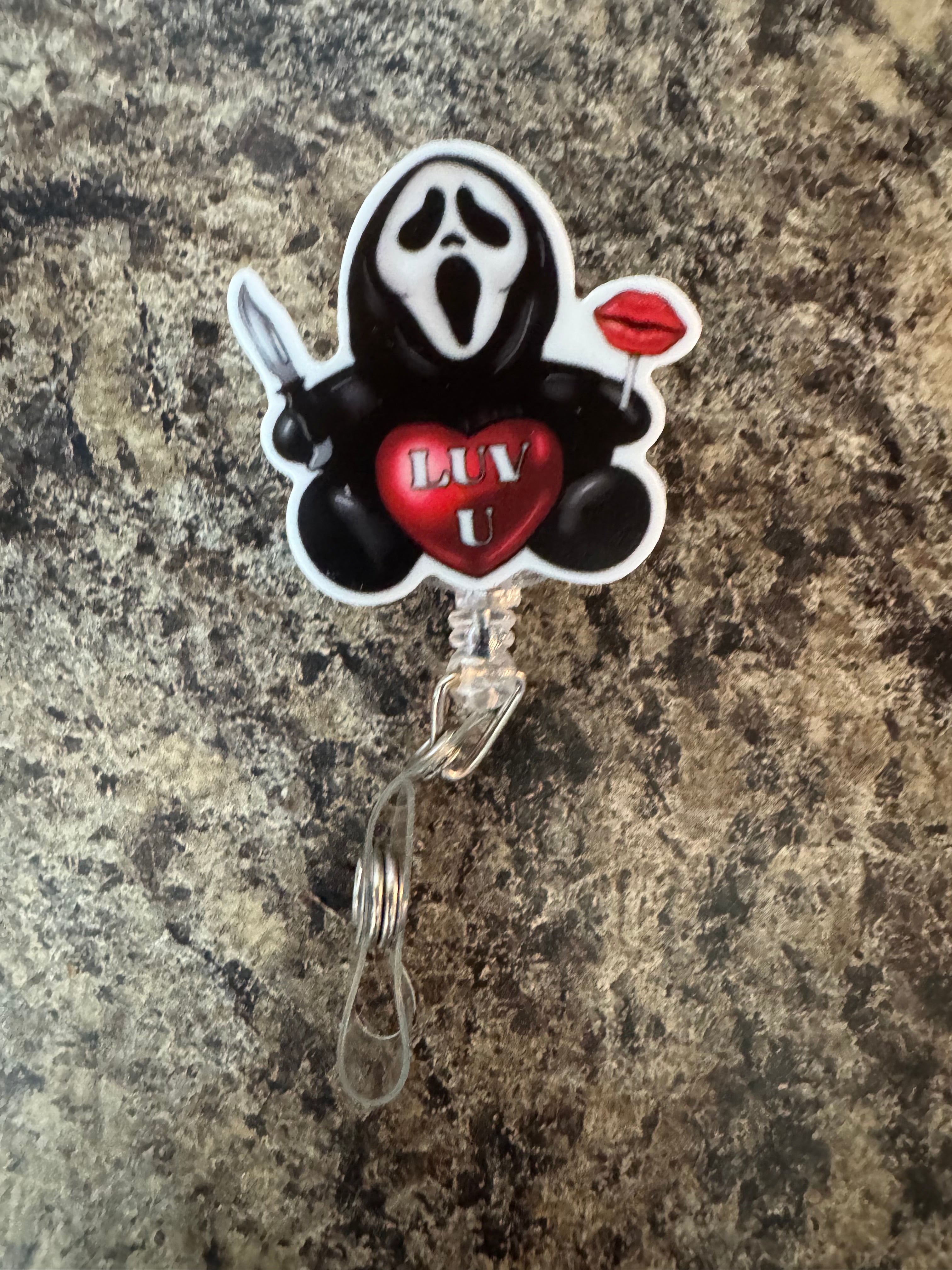 Scream luv you badge reel