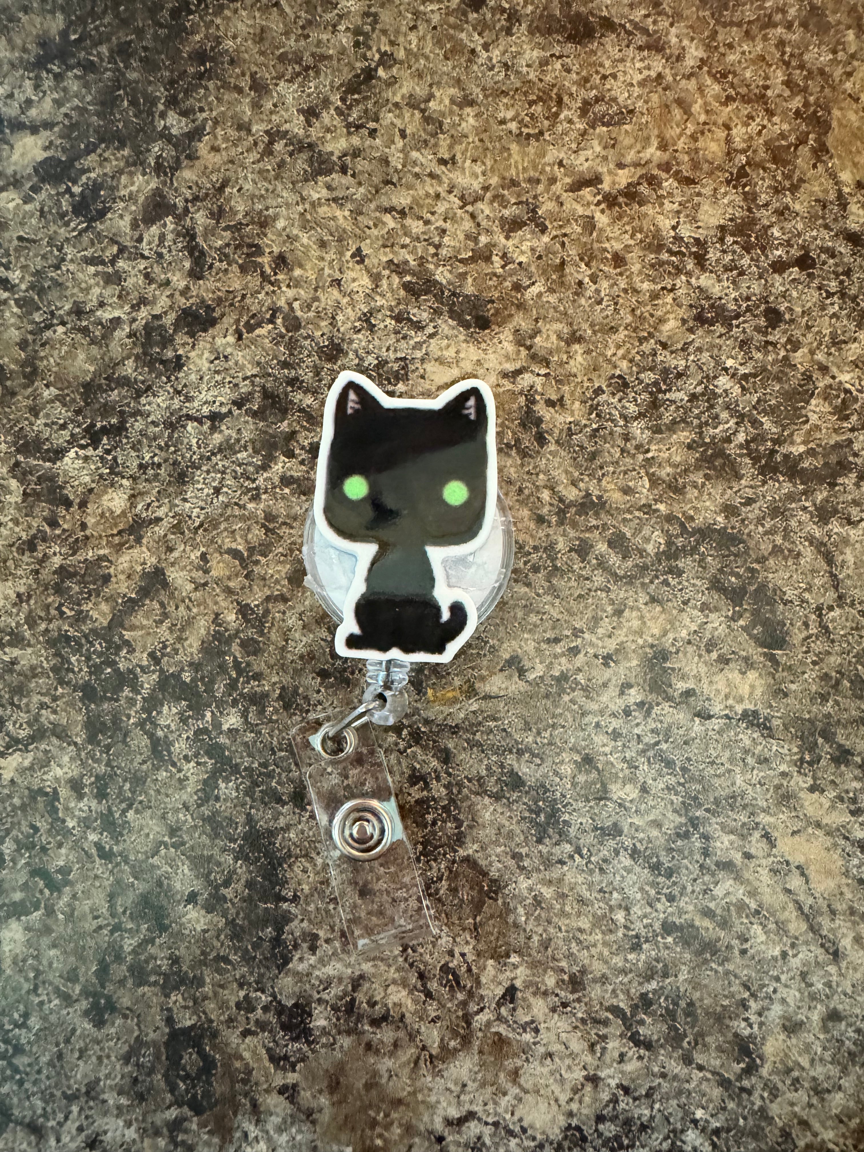 Cat badge reel