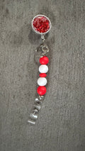 Red jeweled beaded badge reel