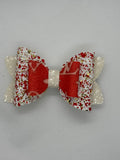 Red sparkle clip bow