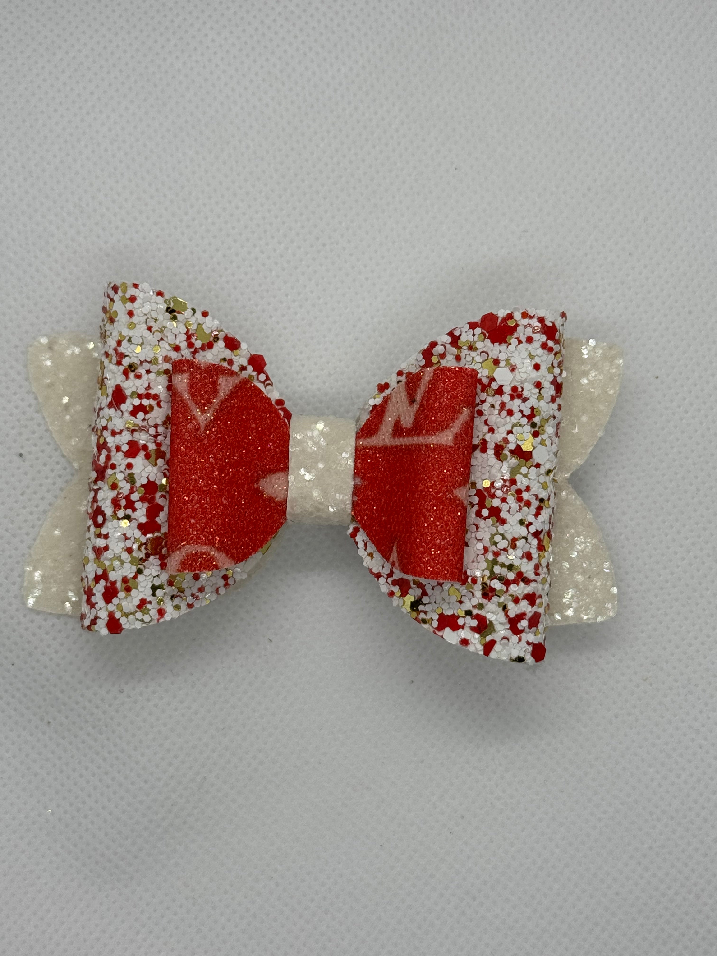 Red sparkle clip bow