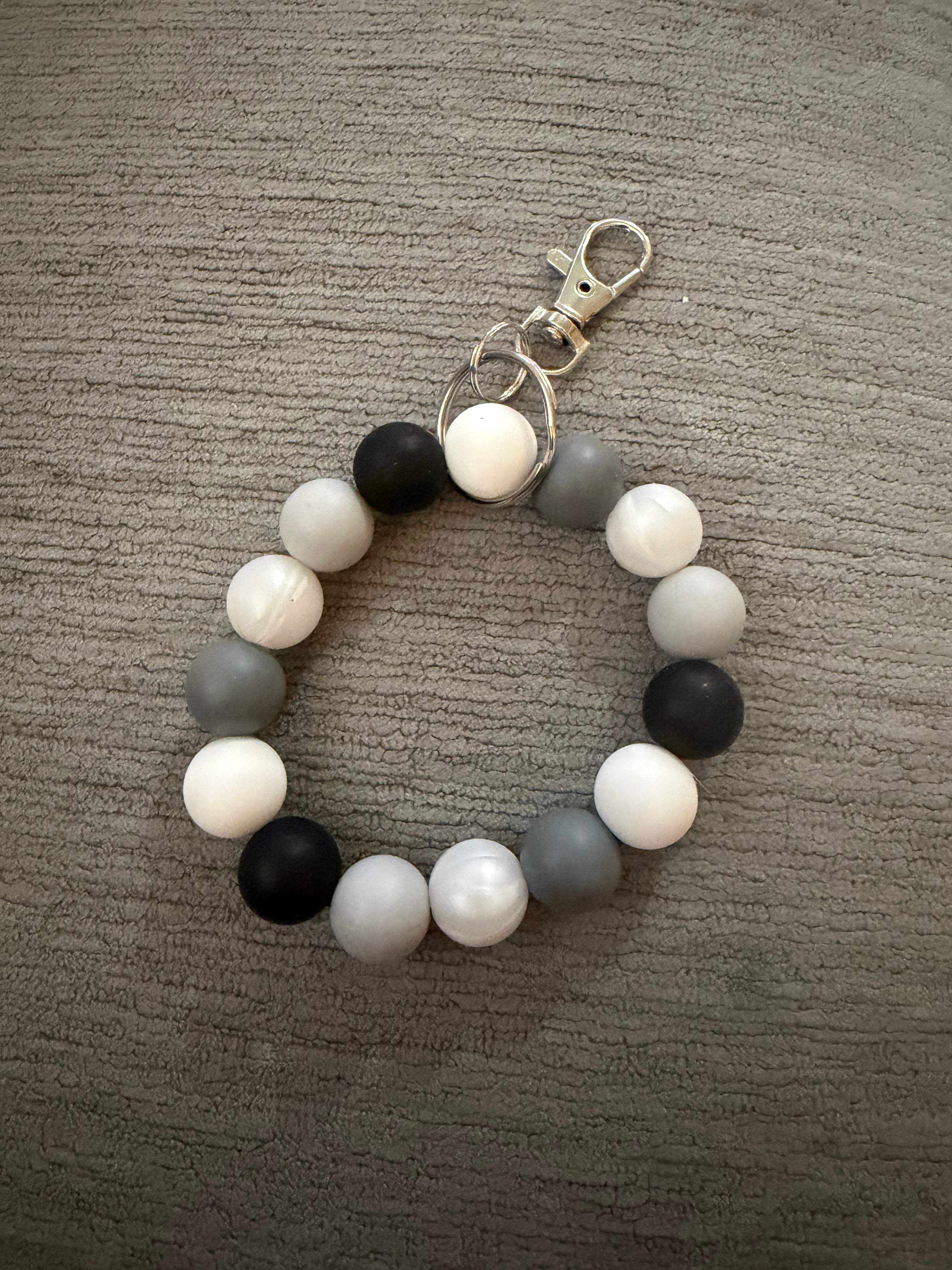 Black to white ombré wristlet