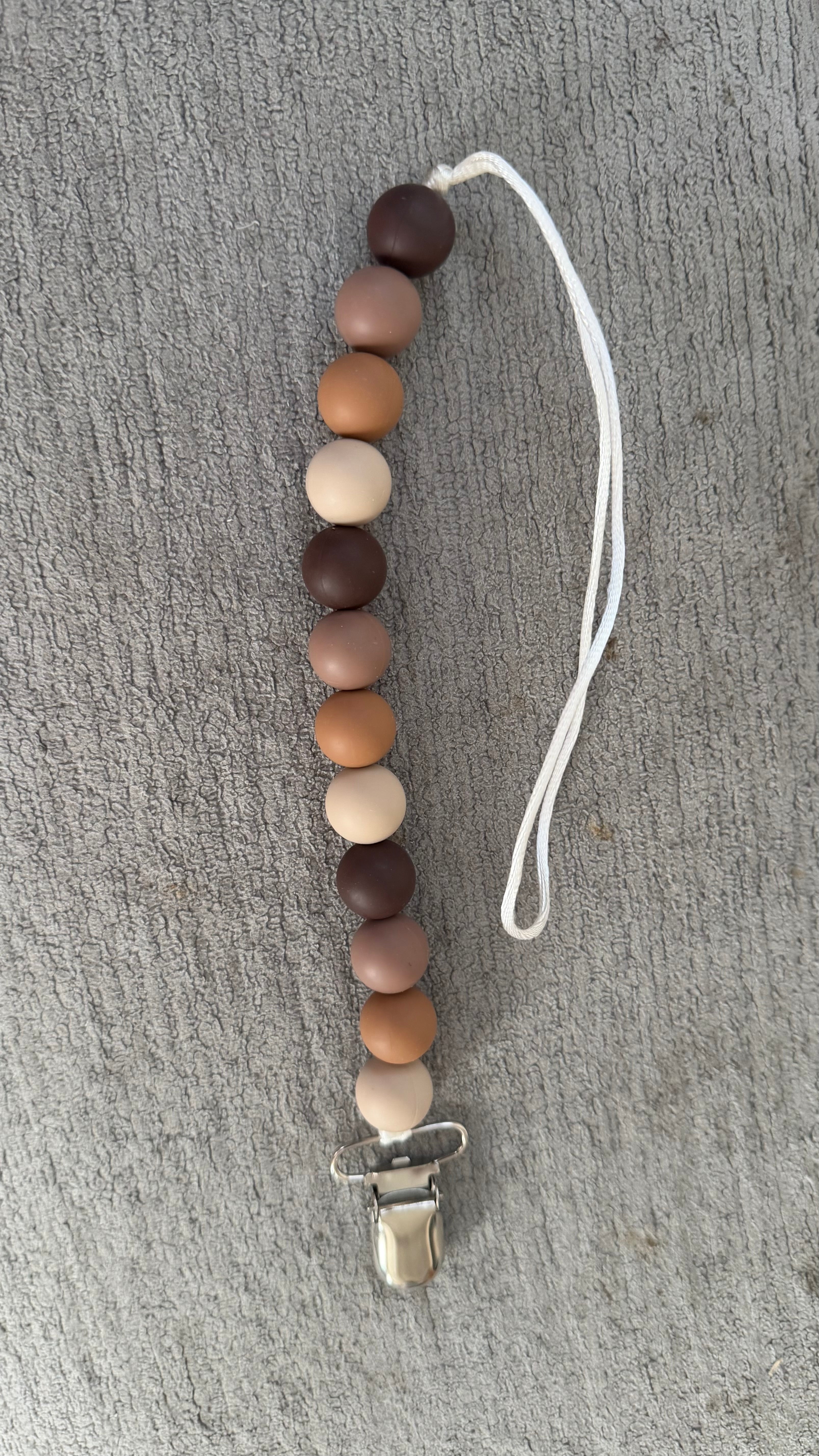 Brown gradient pacifier clip