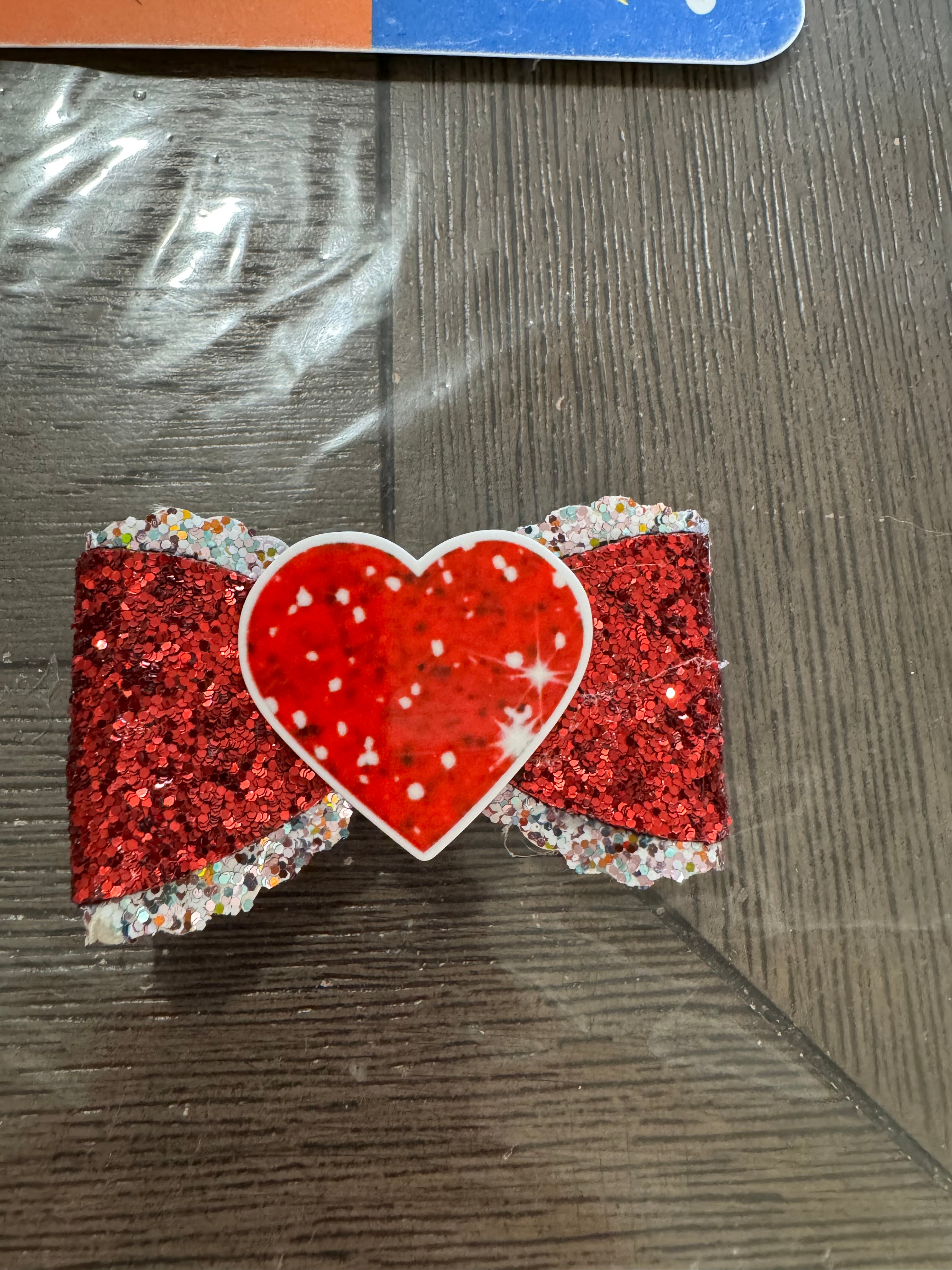 Red heart overlay bow clip