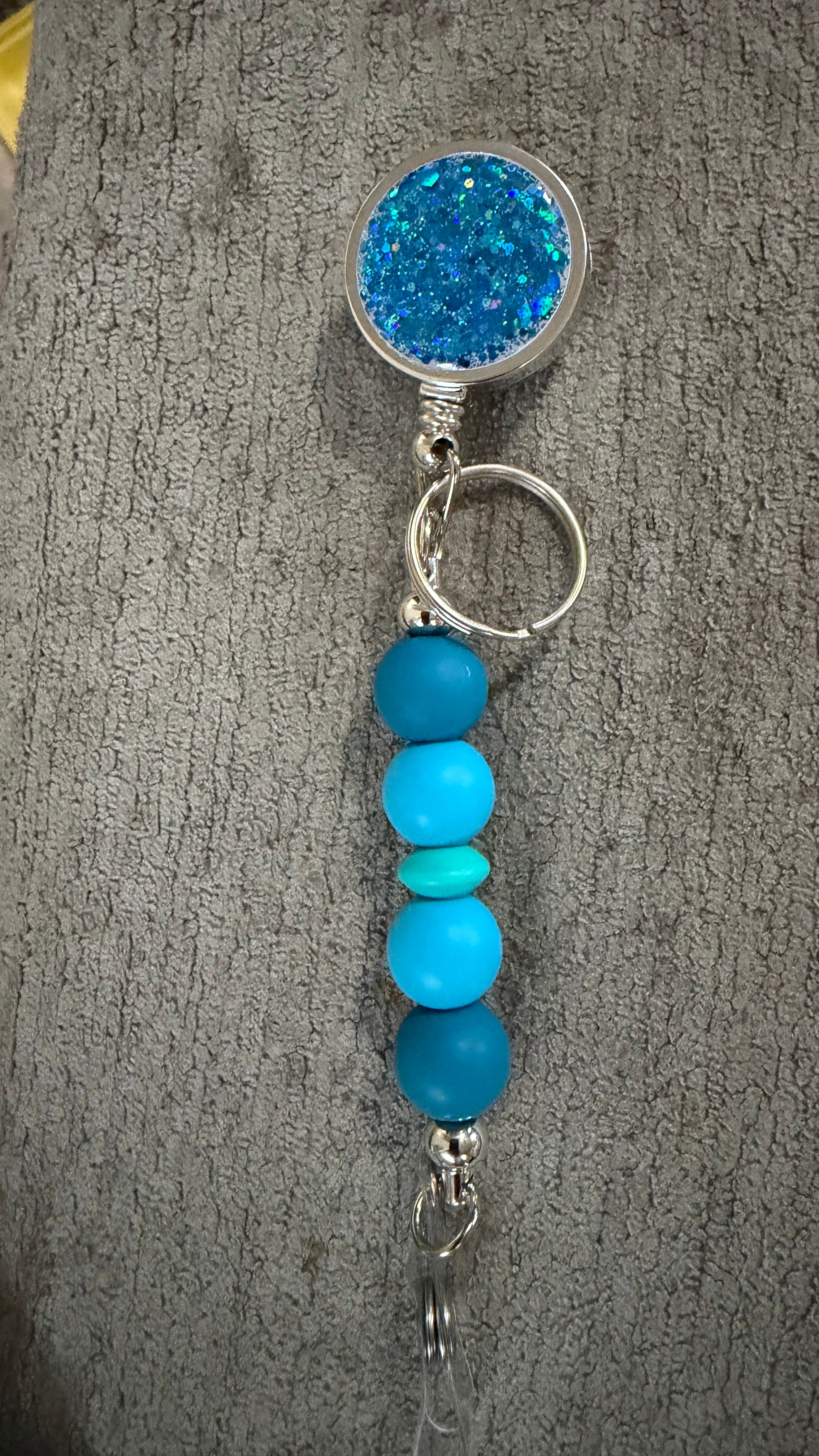 Light blue jeweled beaded badge reel