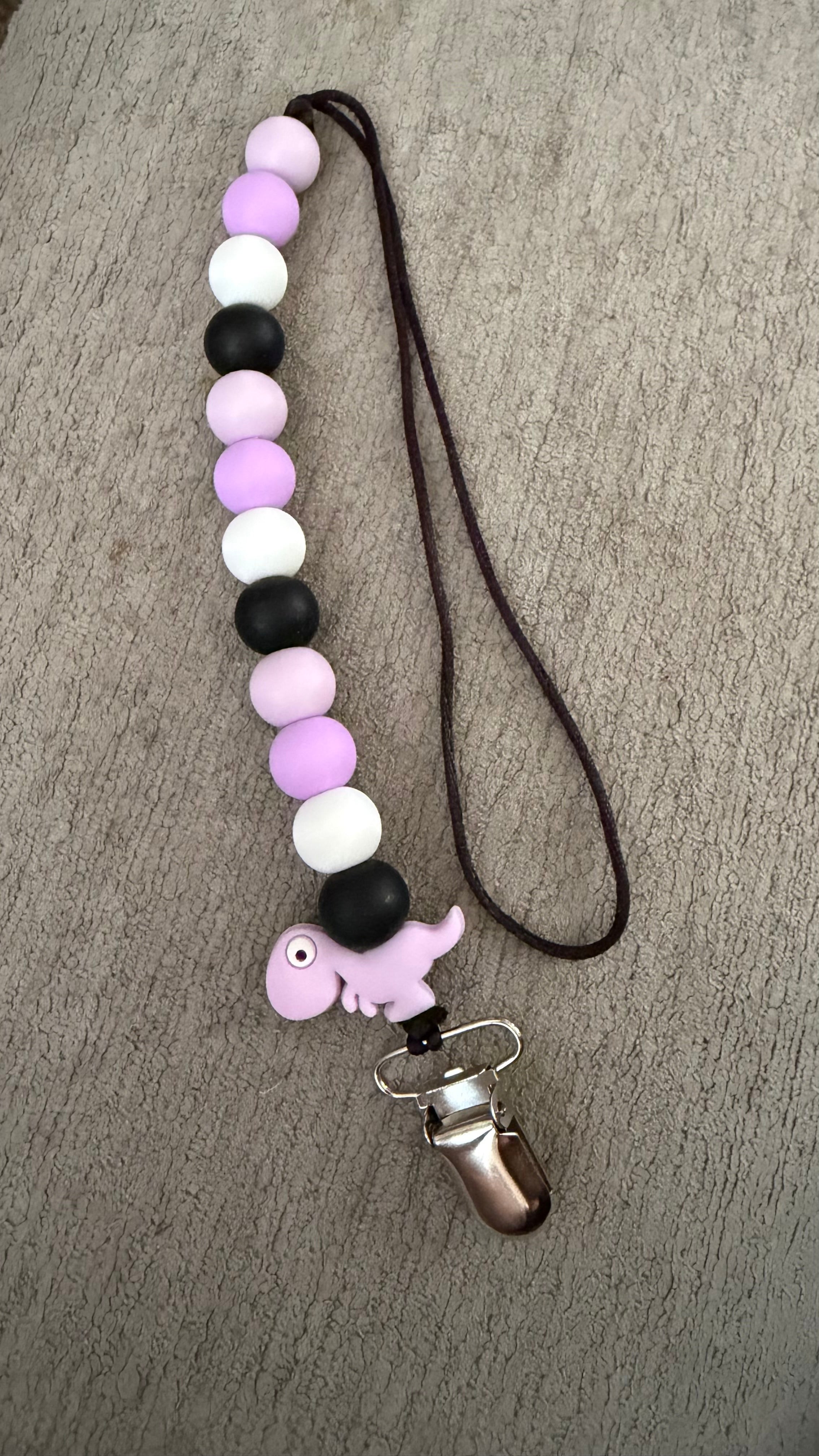 Pink Dino pacifier clip