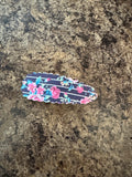 Black floral snap clip
