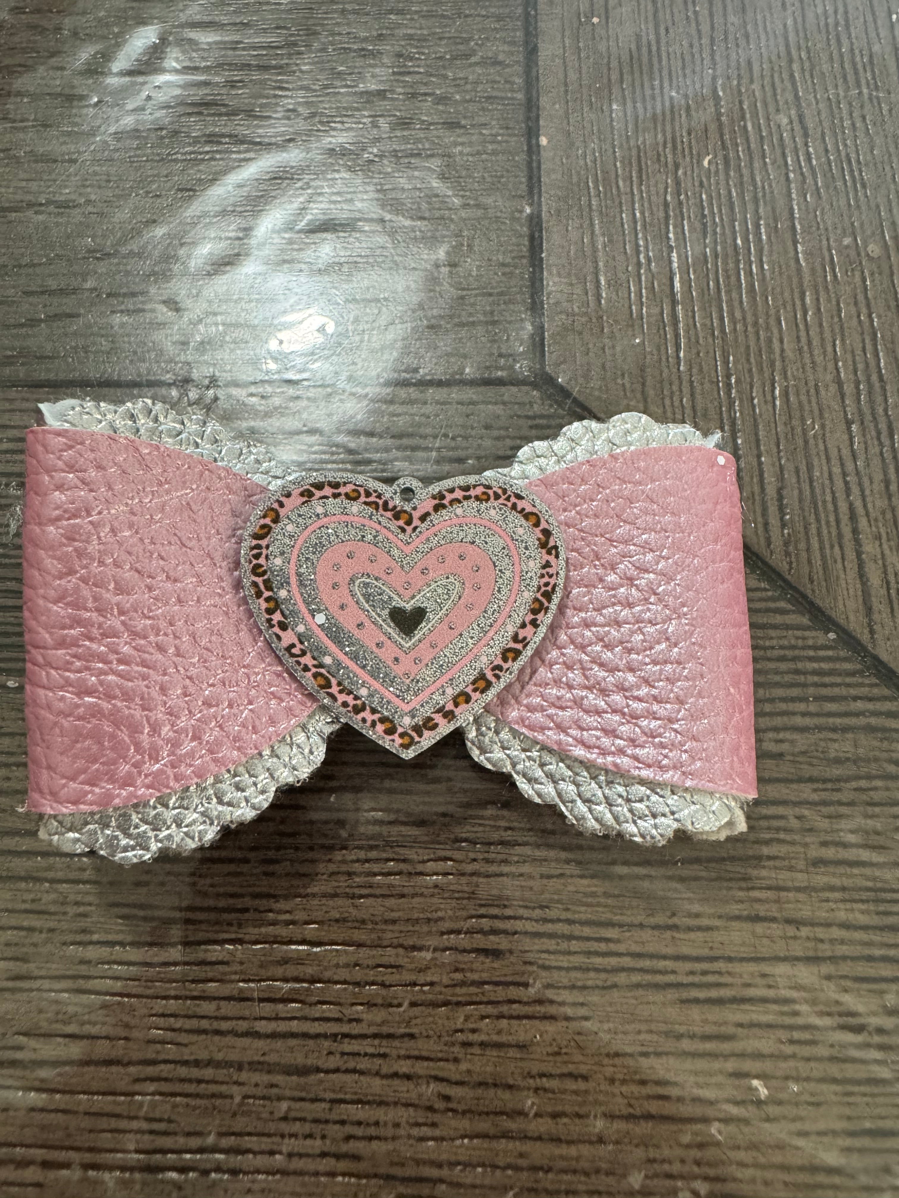 Pink heart overlay bow clip