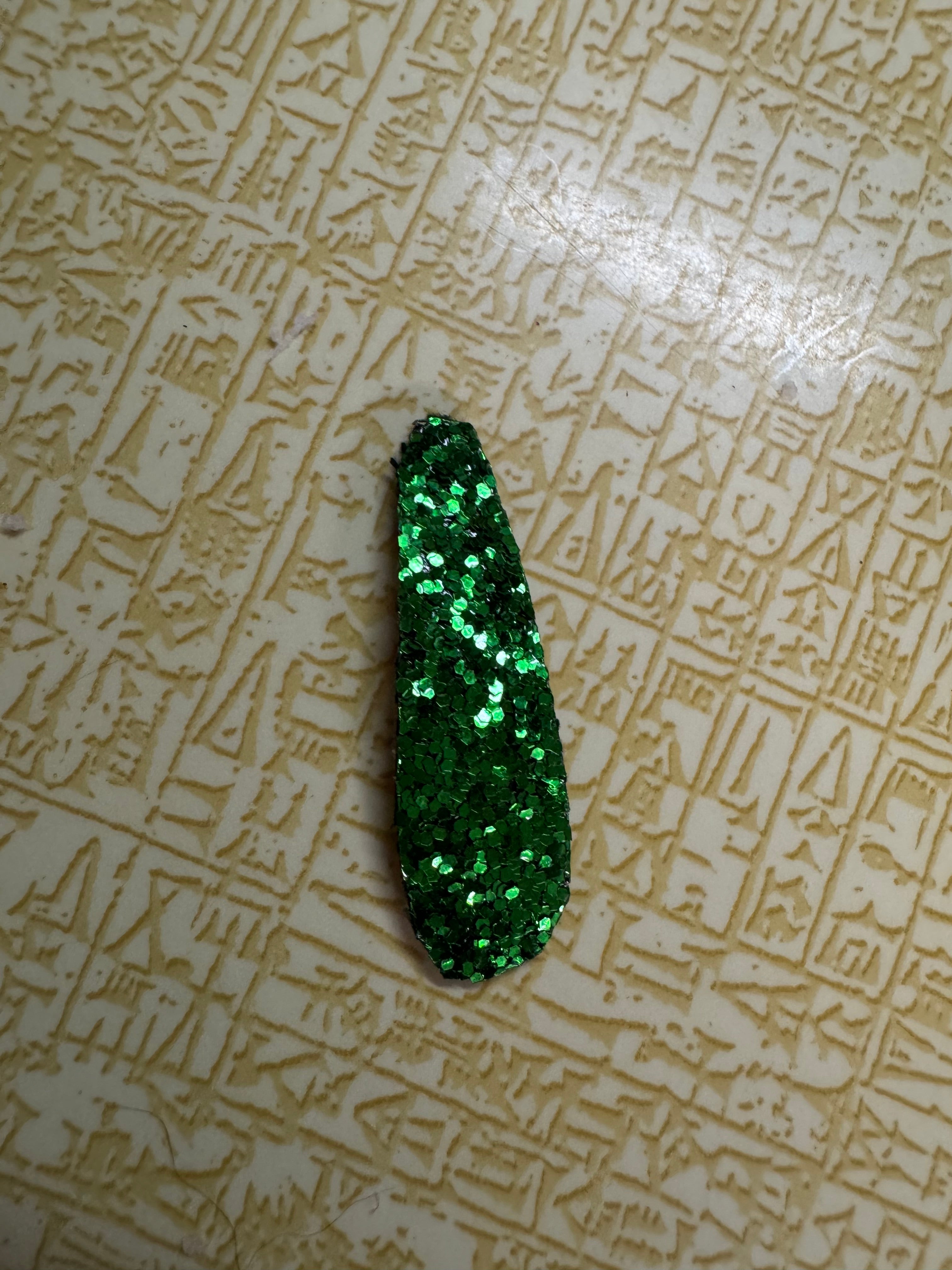 Chunky green glitter snap clip