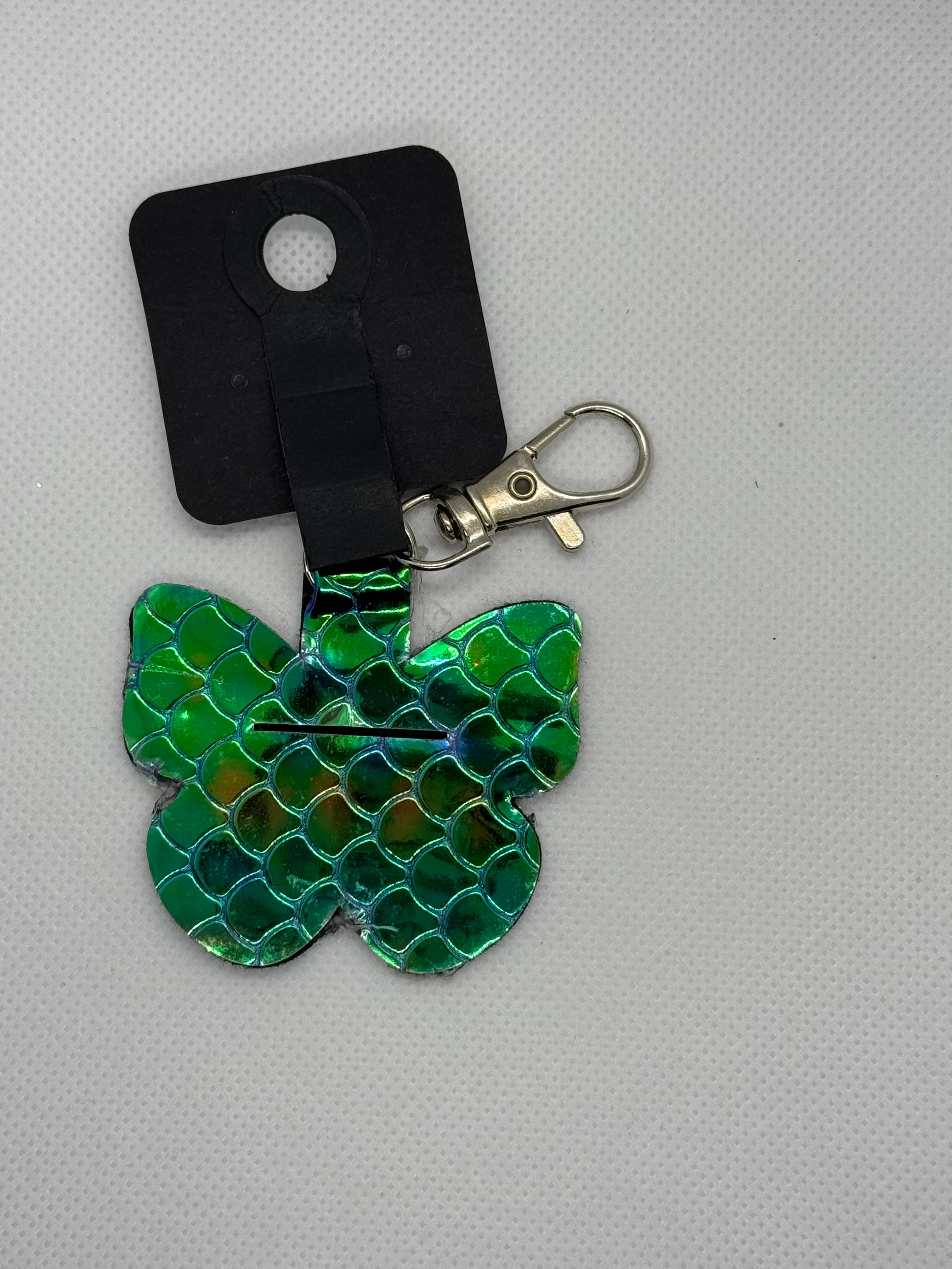 Aldi butterfly green mermaid keychain