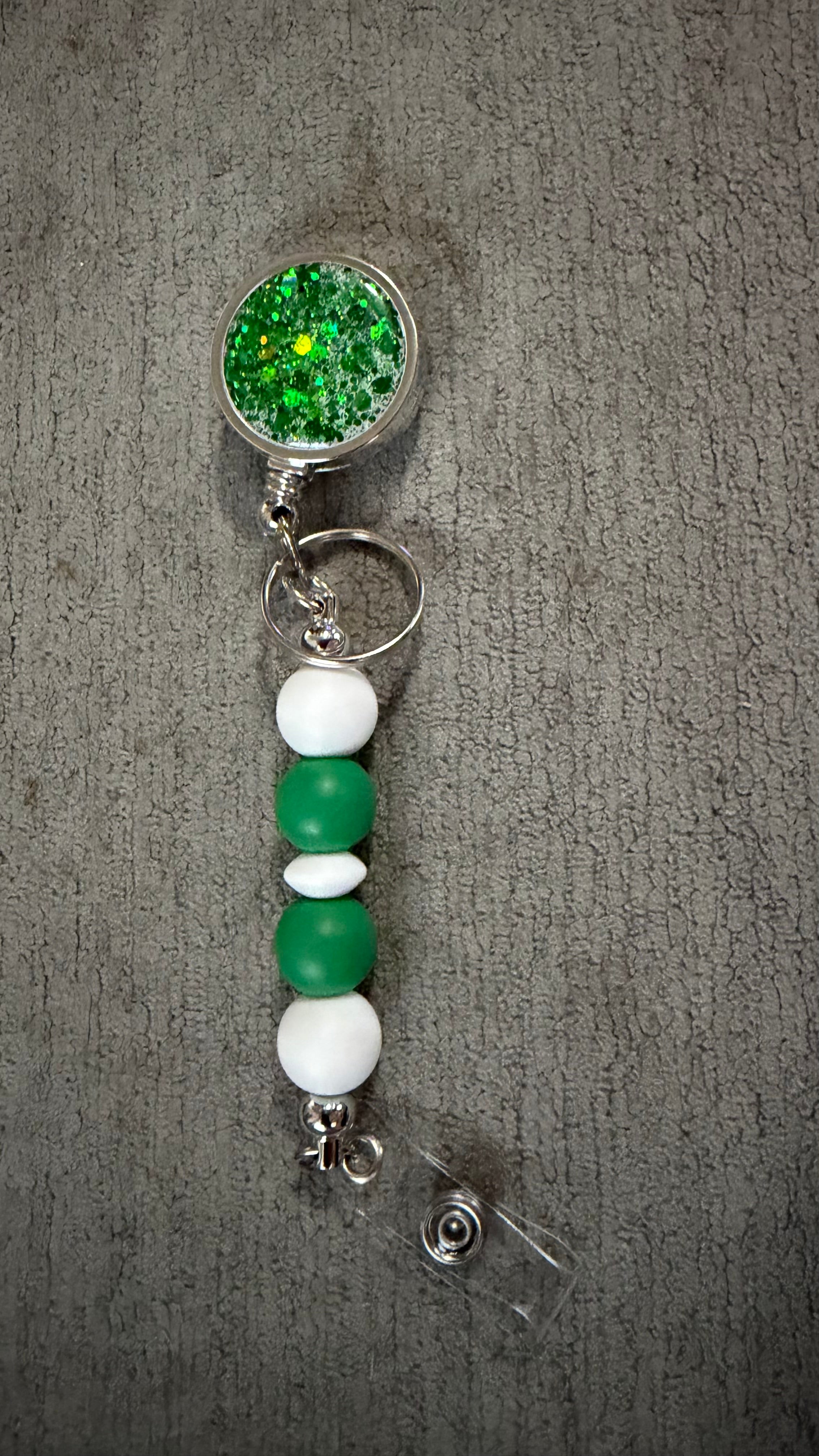 Green jewel beaded badge reel