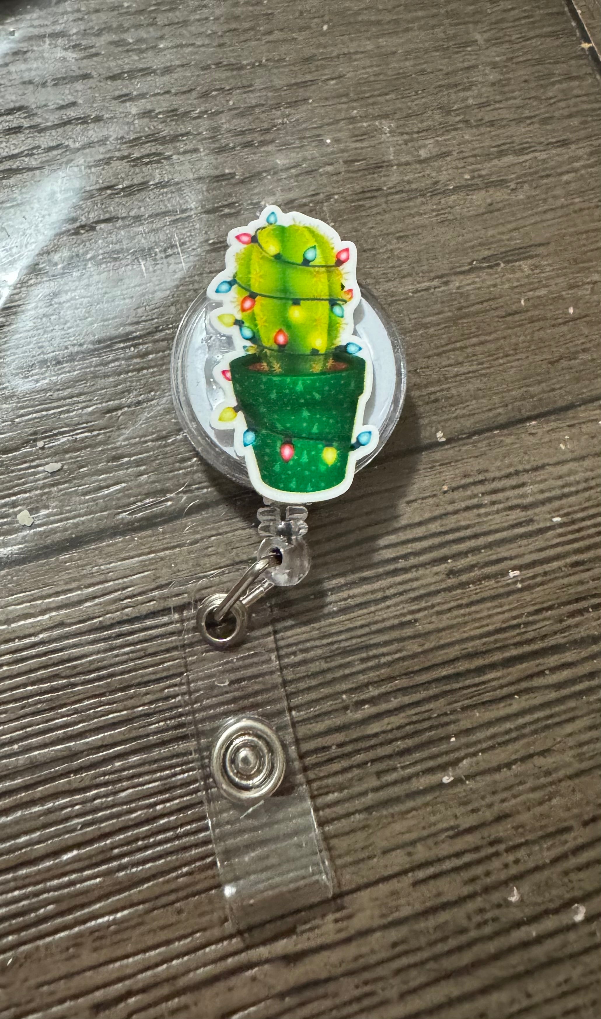 Holiday cactus badge reel