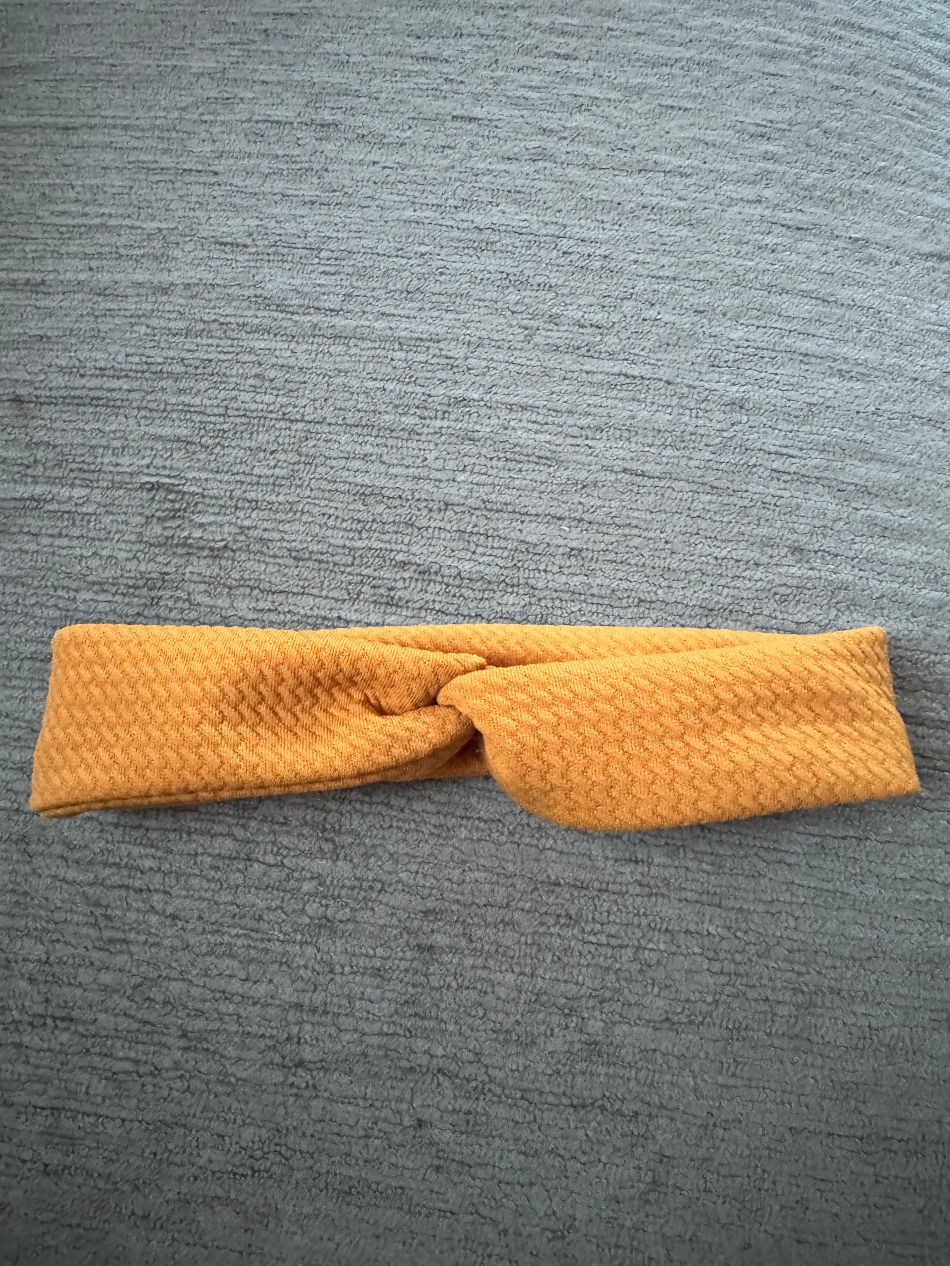 Twisted orange headband child