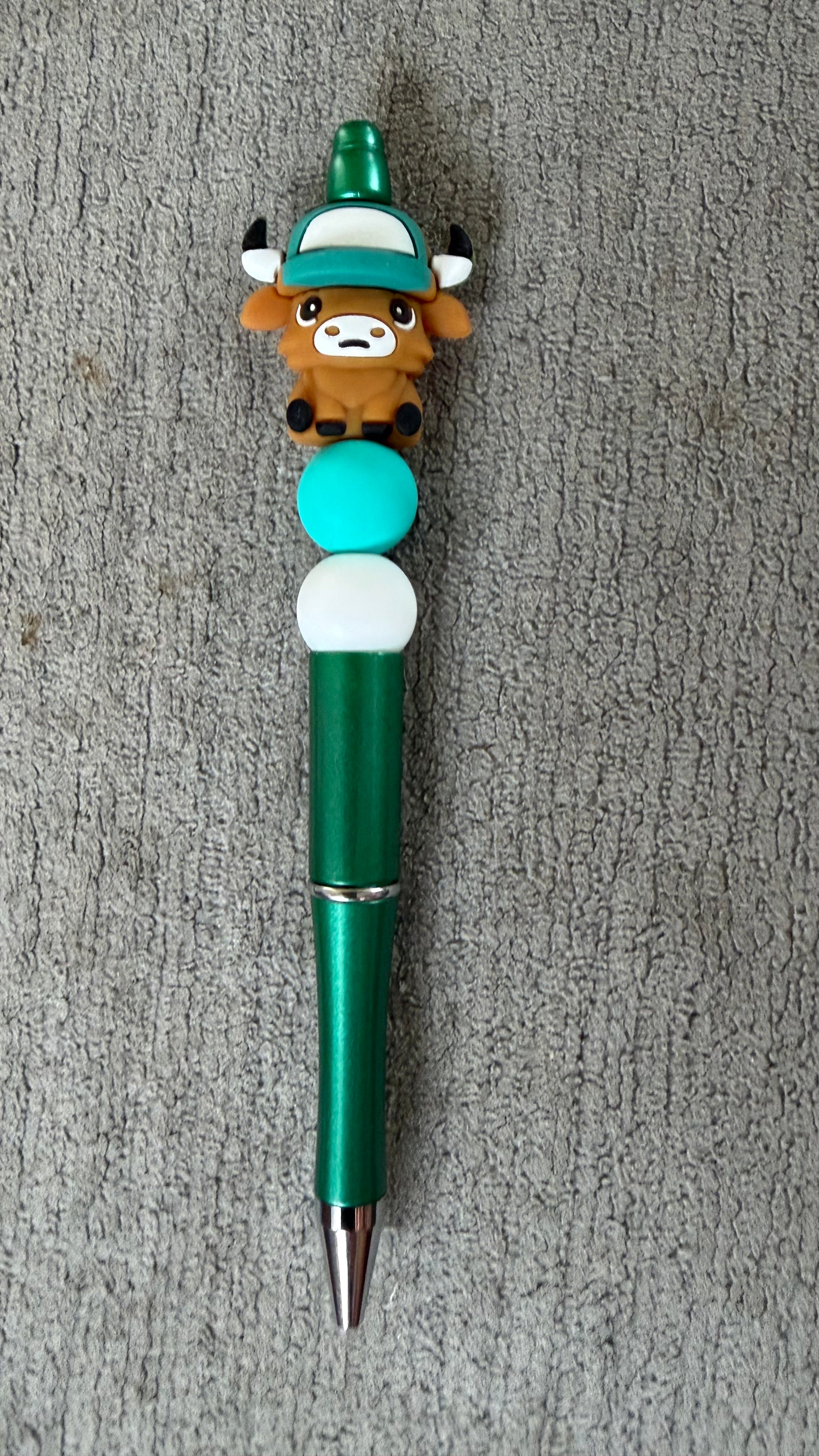 Cow with hat pen