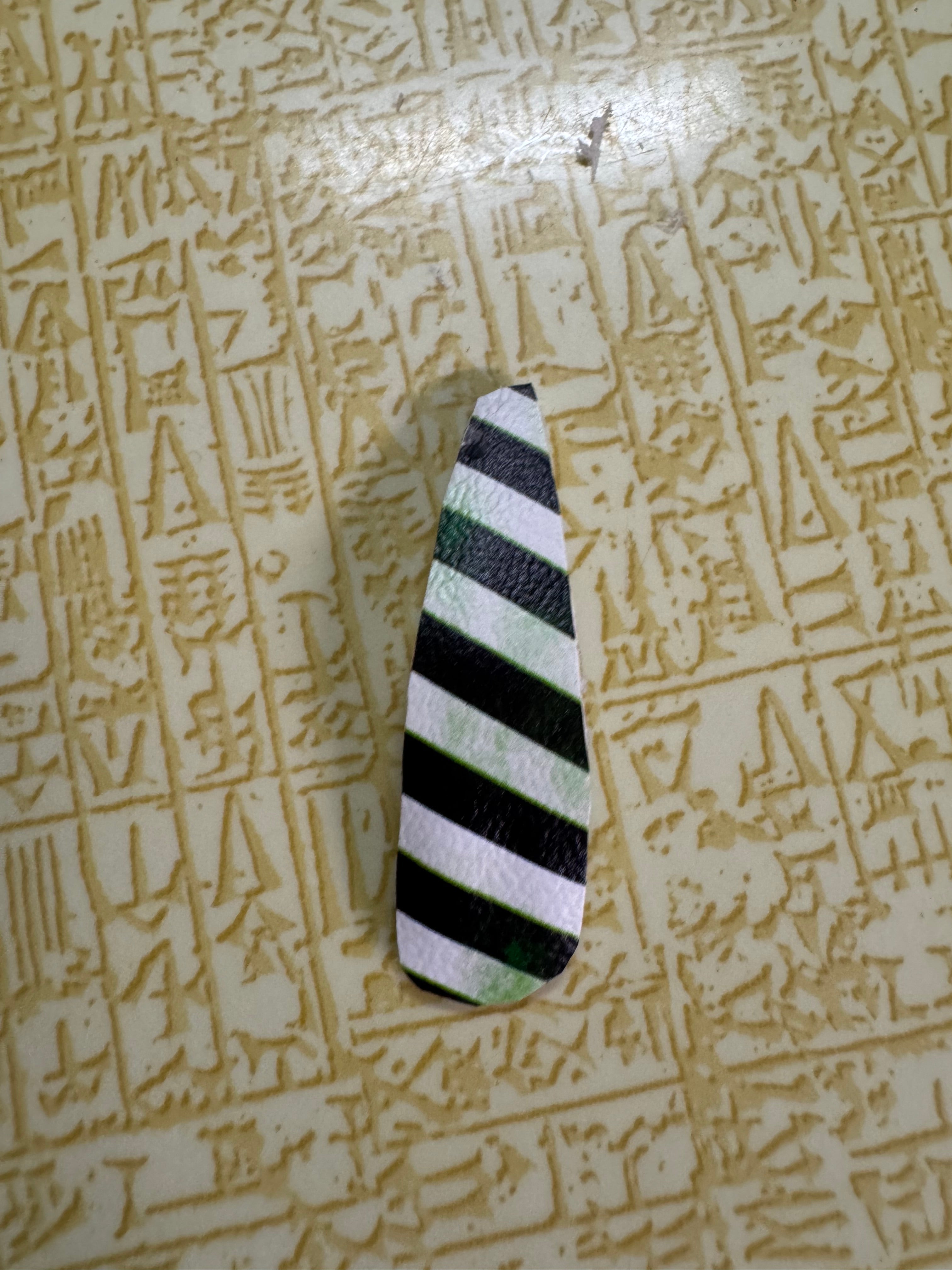 Black and white striped snap clip