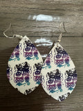 Vastly over rated dangle earrings