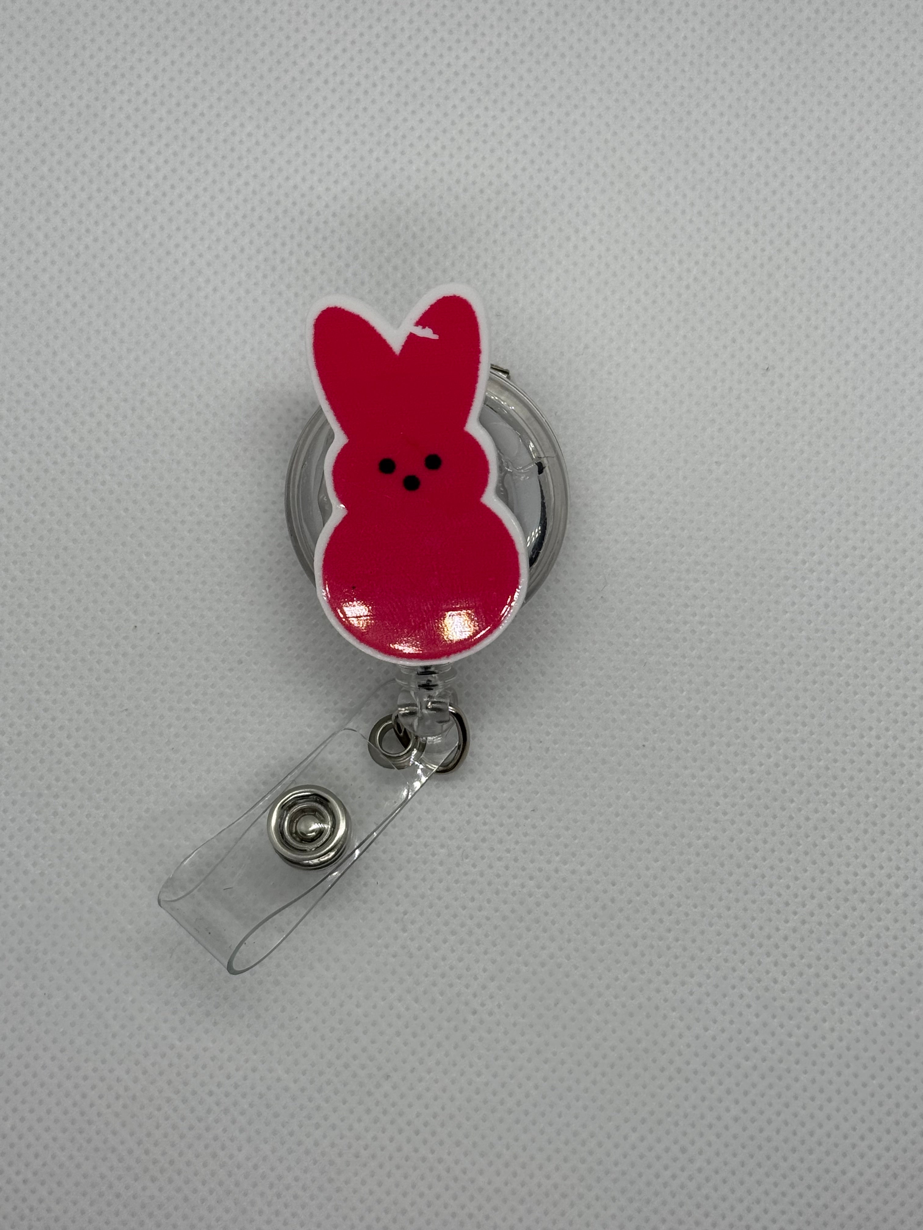 Red peep badge reel