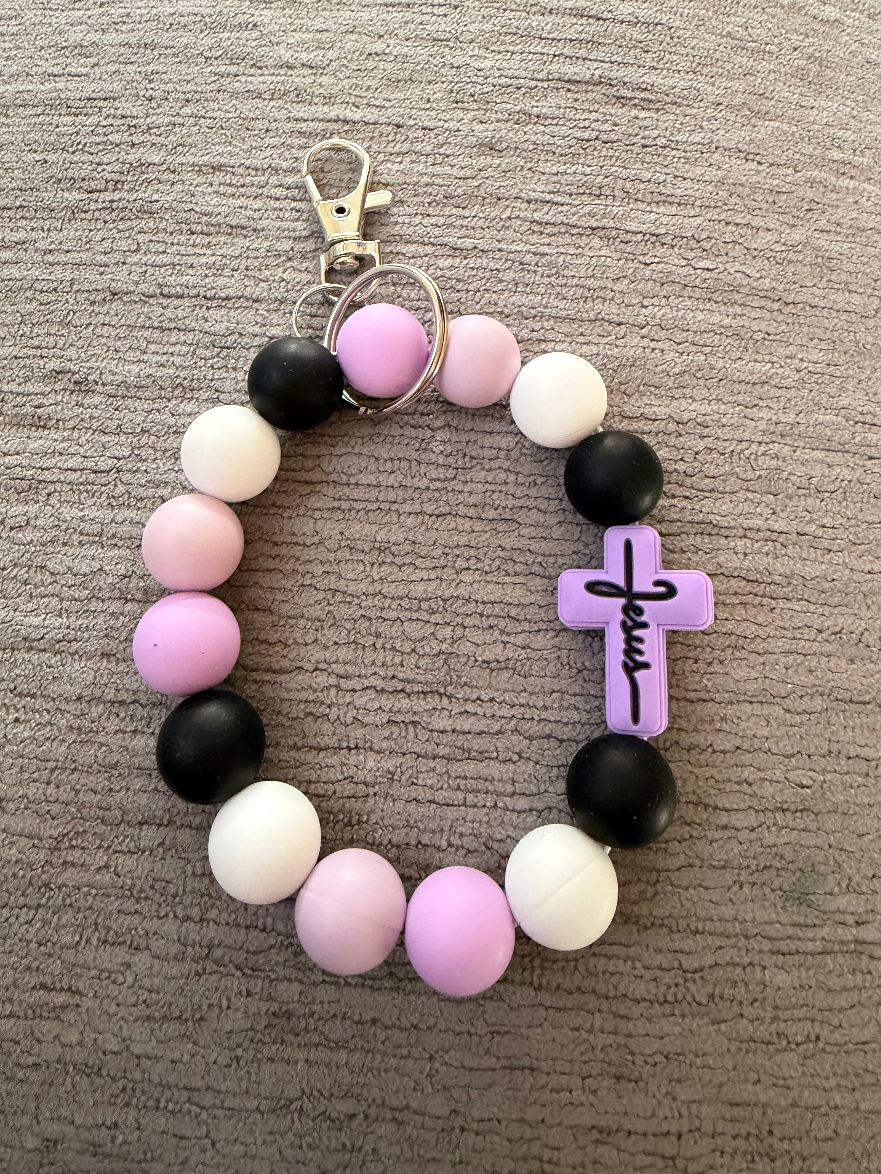 Purple Jesus wristlet