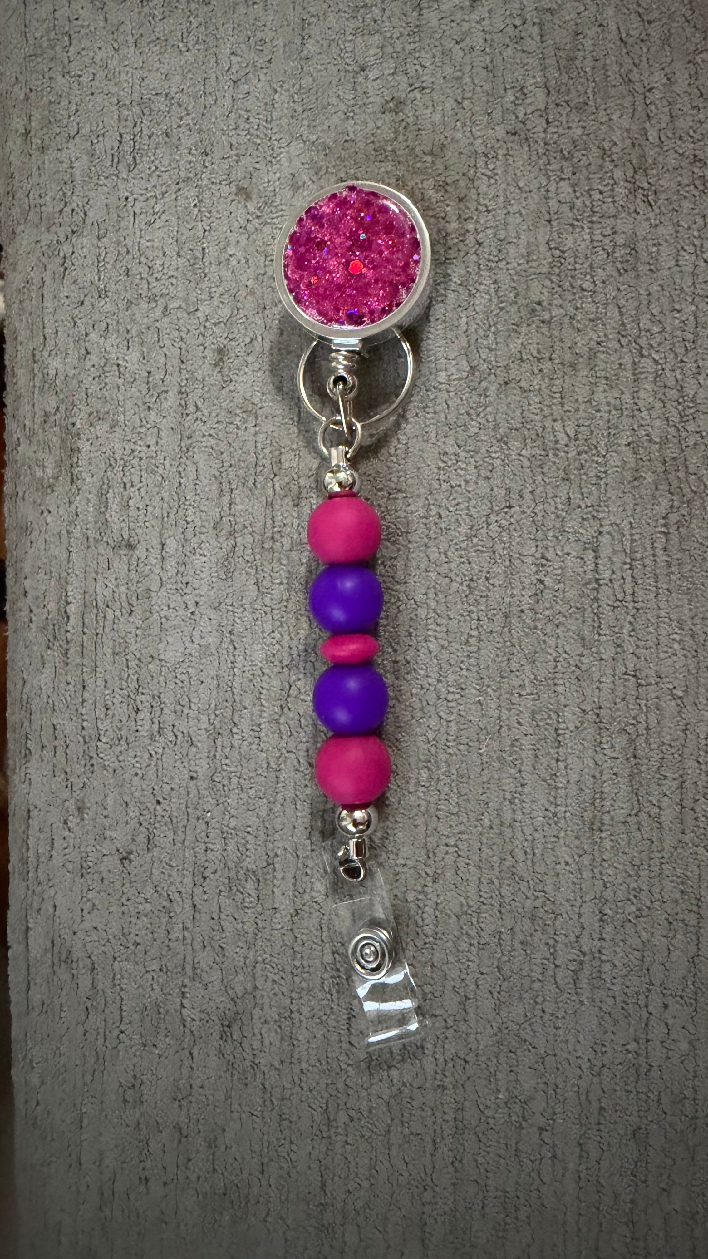 Purple jeweled beaded badge reel