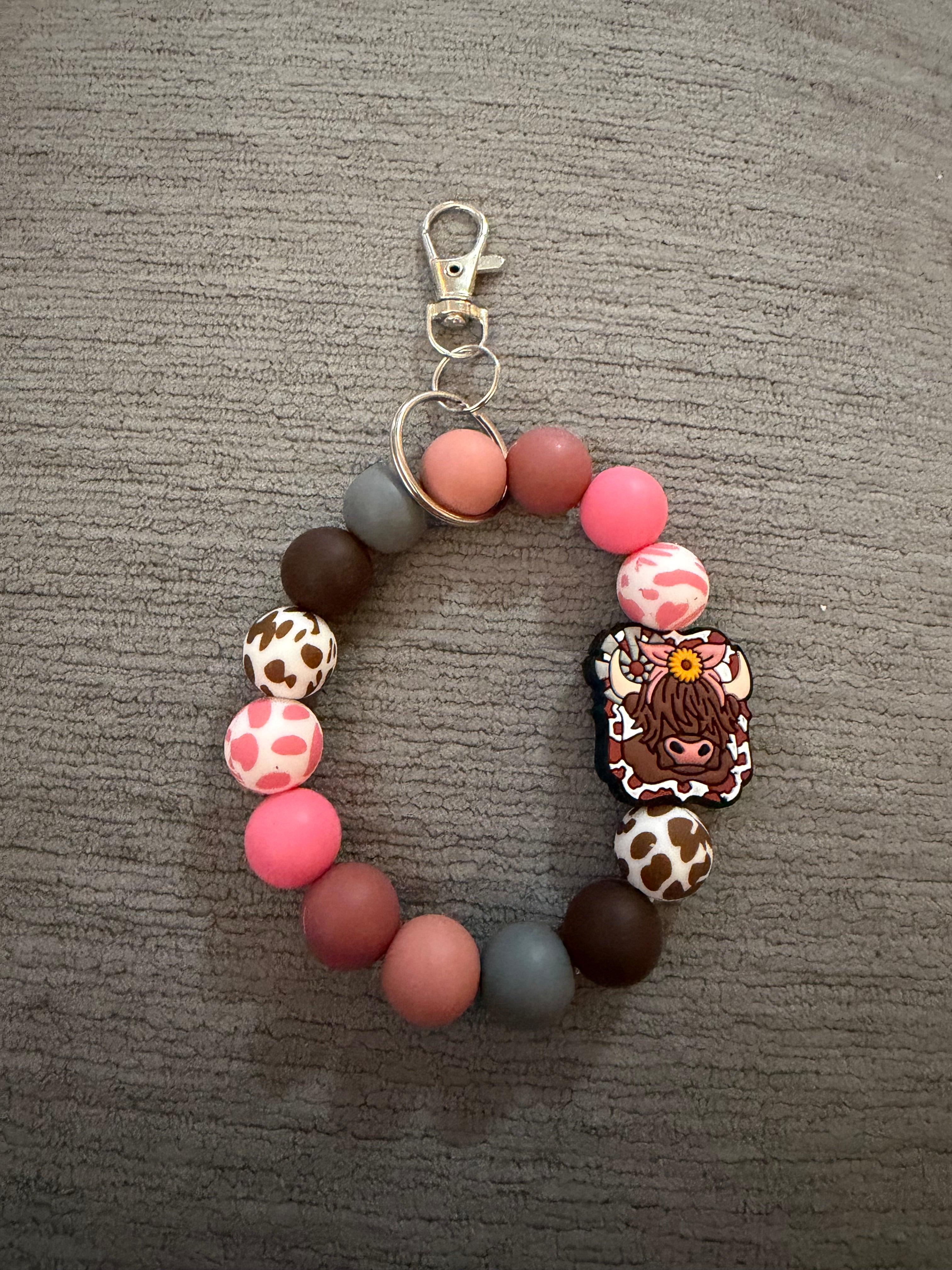 Pink and brown cow wristlet