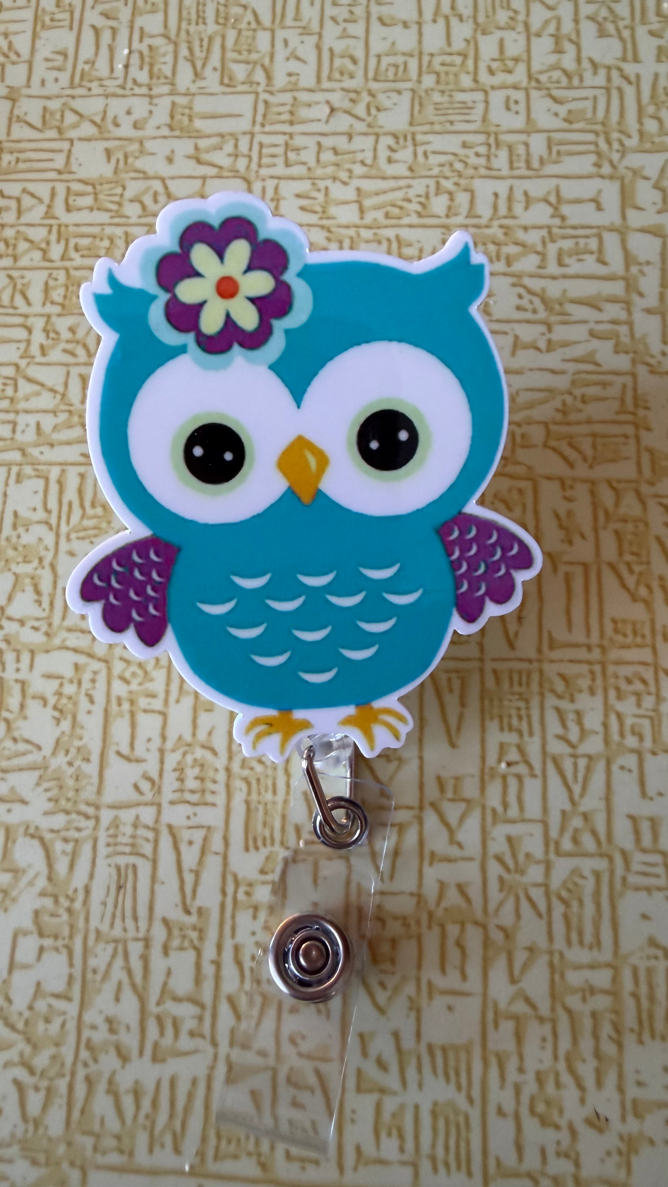Big owl badge reel