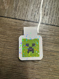 Green face bookmark