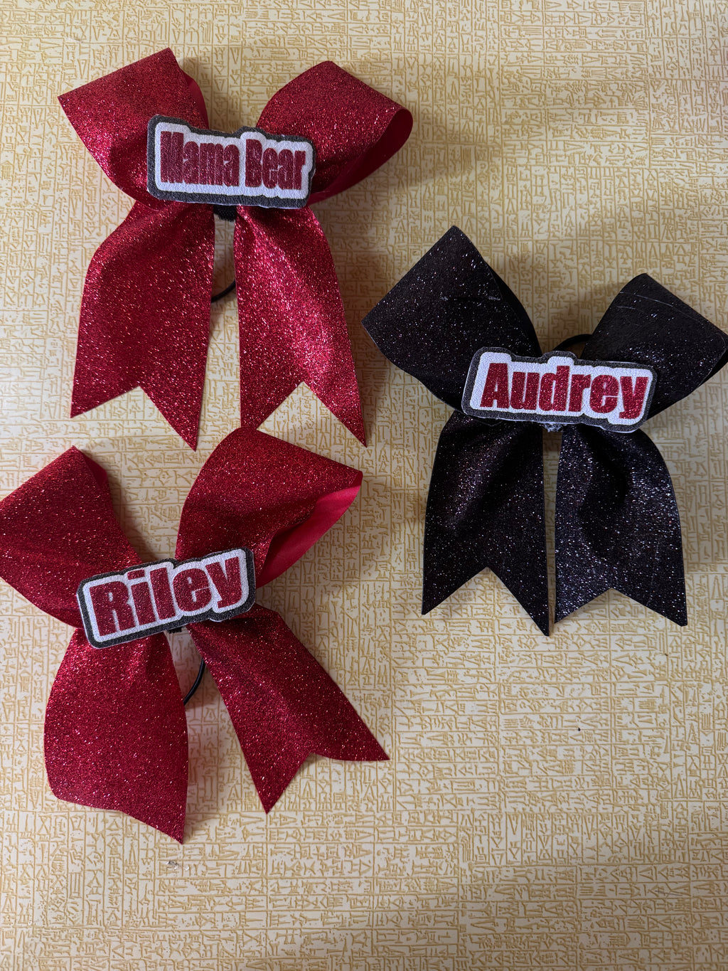 Removable cheer bow centers