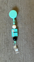 nurse and co beaded badge reel