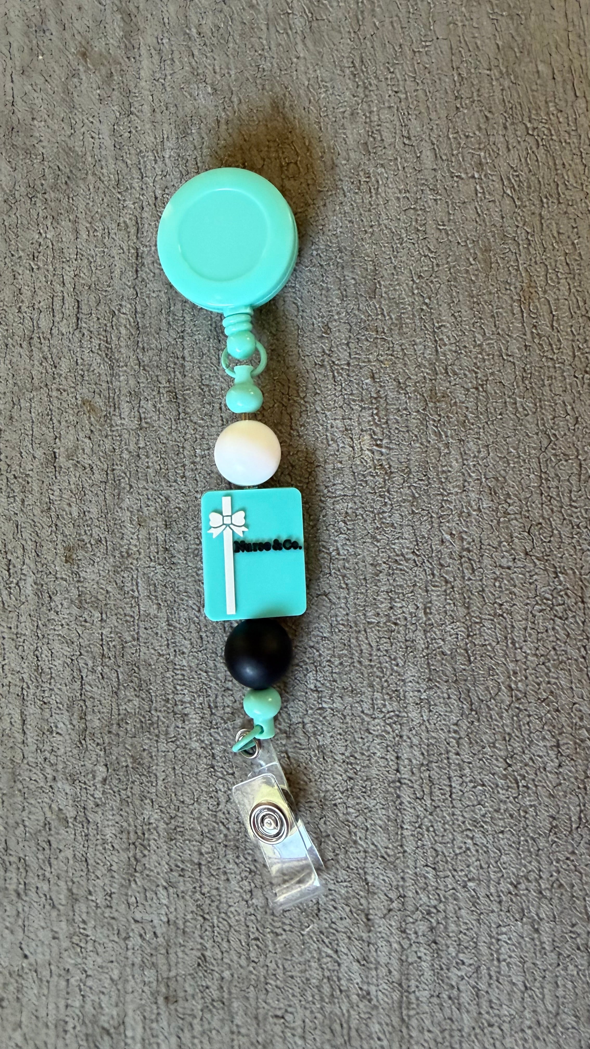 nurse and co beaded badge reel